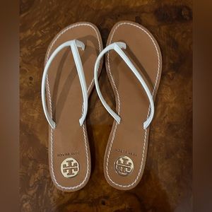 Tory Burch white flip flops size 11.